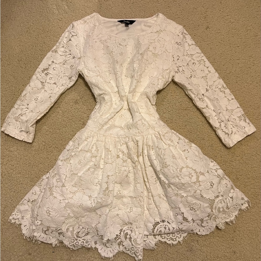 Long sleeve lacy dress. Intricate floral designs. - Picture 1 of 1